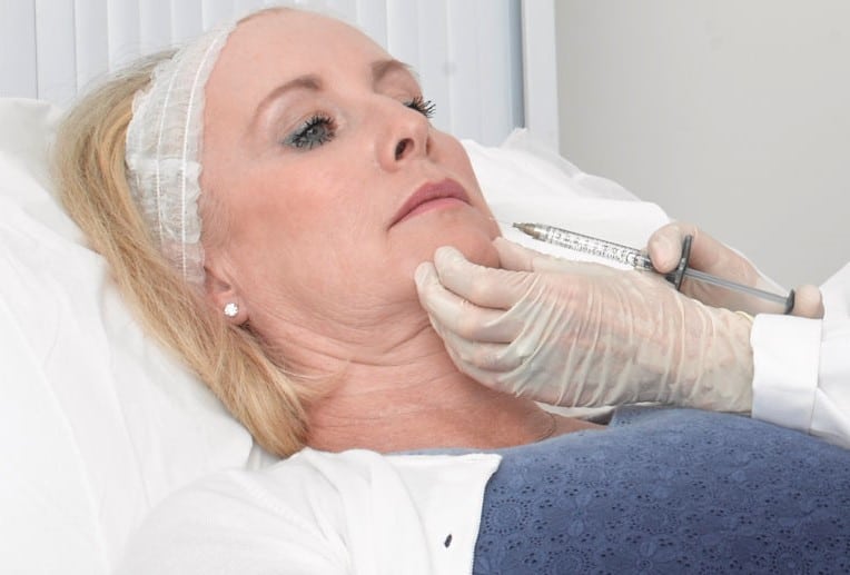 lip fillers treatment on patient